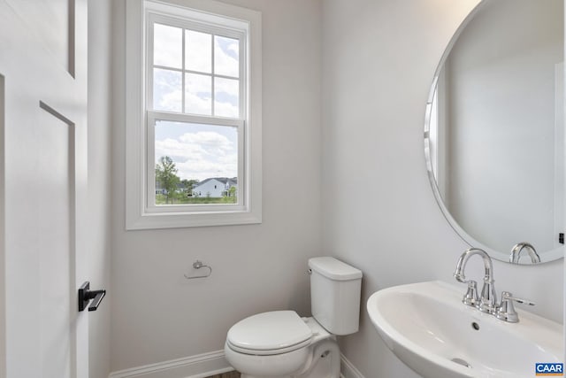 bathroom with sink and toilet