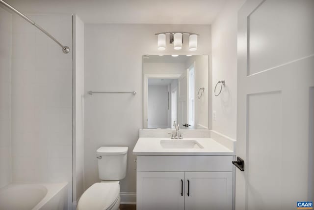 full bathroom with vanity, toilet, and tiled shower / bath