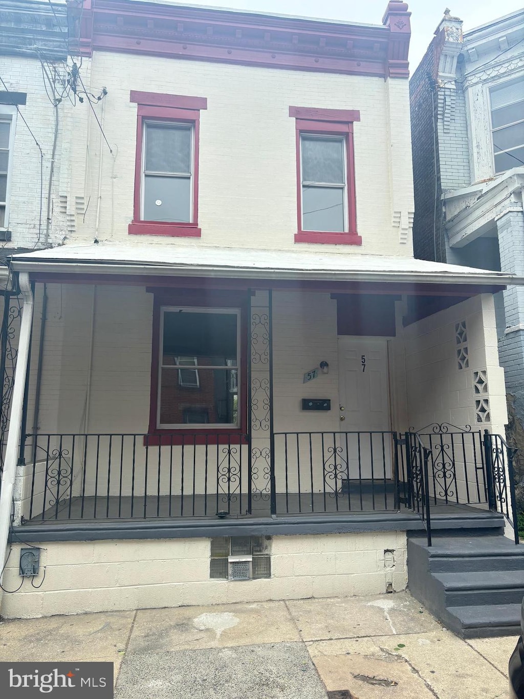 multi unit property featuring covered porch