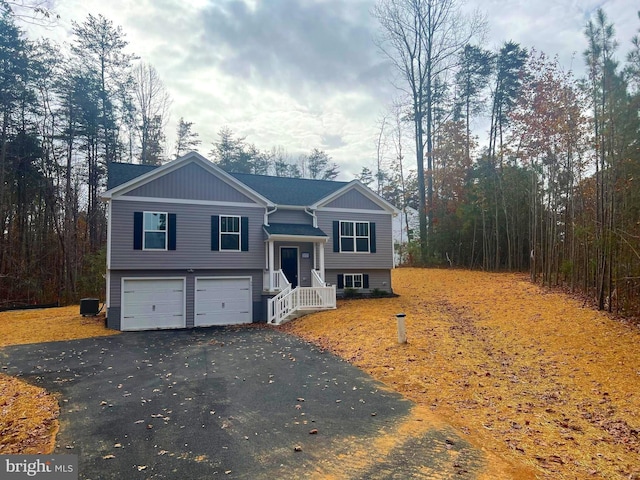 split foyer home featuring a garage