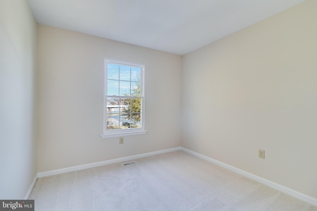 view of carpeted spare room