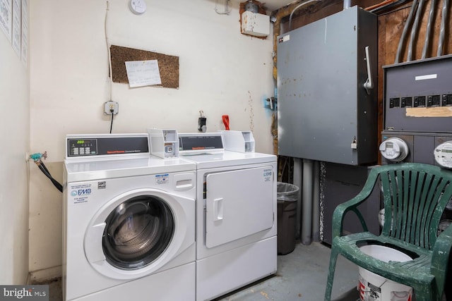 laundry room featuring separate washer and dryer