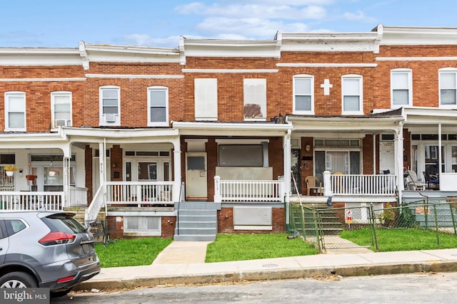 multi unit property featuring covered porch