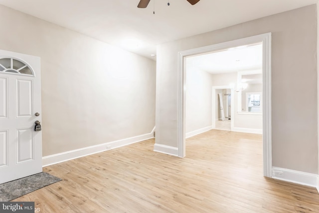 entrance foyer featuring ceiling fan and light hardwood / wood-style floors