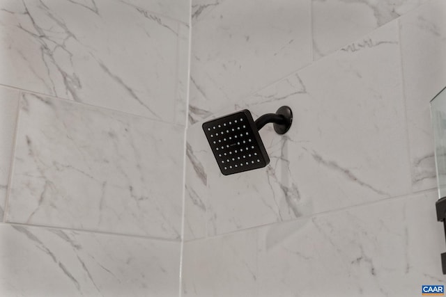 details featuring a tile shower