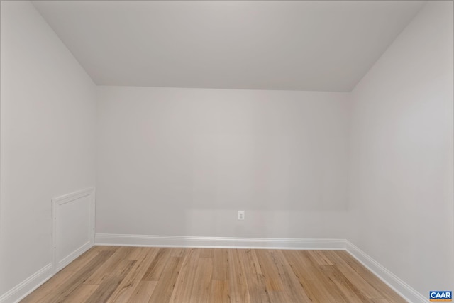 spare room featuring light hardwood / wood-style flooring