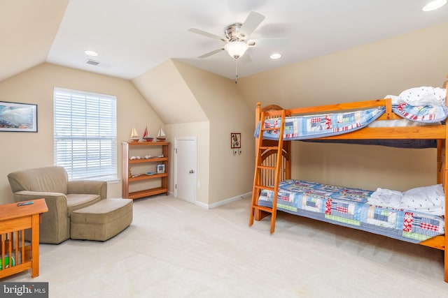 bedroom featuring visible vents, ceiling fan, baseboards, carpet, and vaulted ceiling