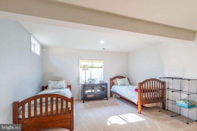 carpeted bedroom with recessed lighting, visible vents, and baseboards