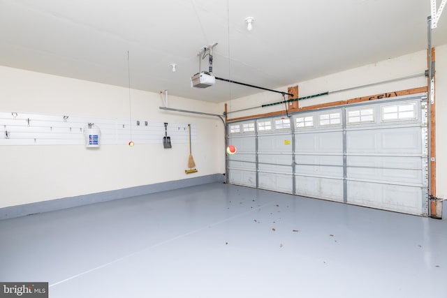 garage featuring a garage door opener