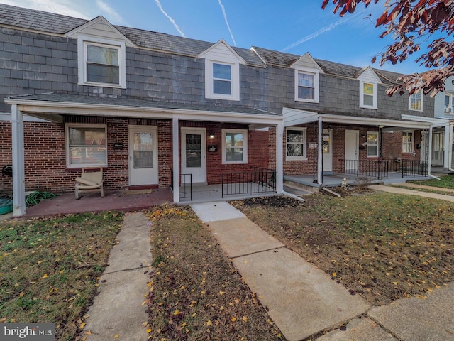 view of property with covered porch