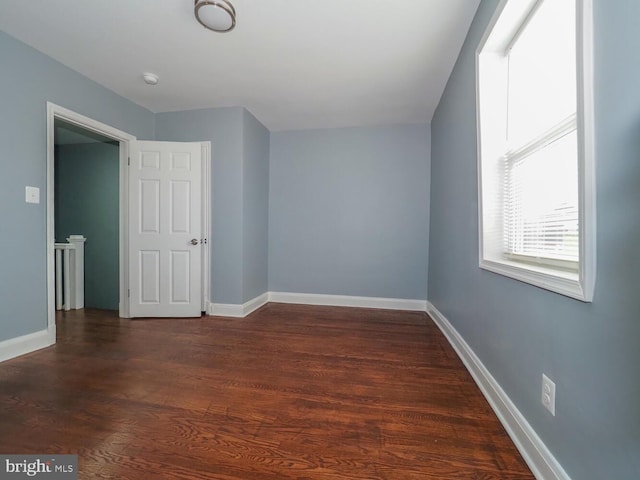 interior space with dark wood-type flooring