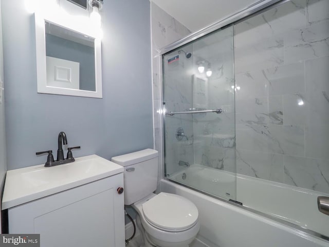 full bathroom with vanity, toilet, and enclosed tub / shower combo