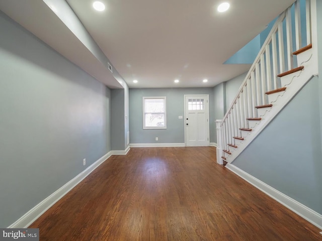 foyer with wood-type flooring