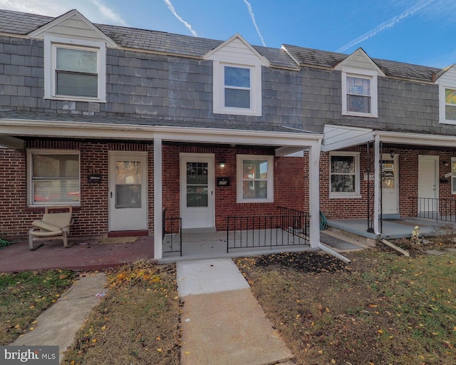 view of property featuring a porch