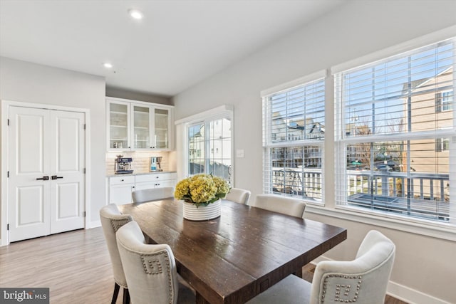 dining area with light wood-type flooring