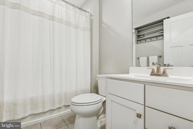 full bathroom with tile patterned flooring, shower / bath combination with curtain, vanity, and toilet