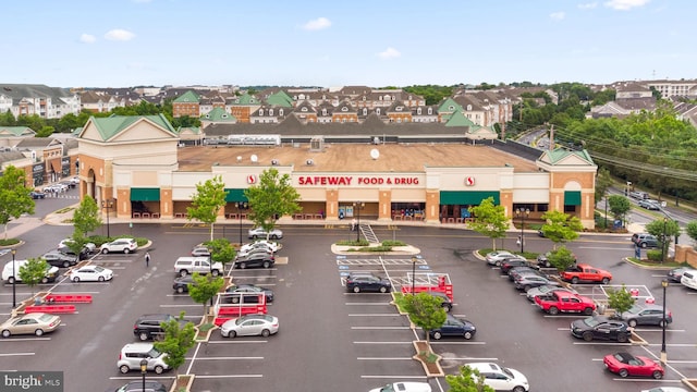 view of property with uncovered parking