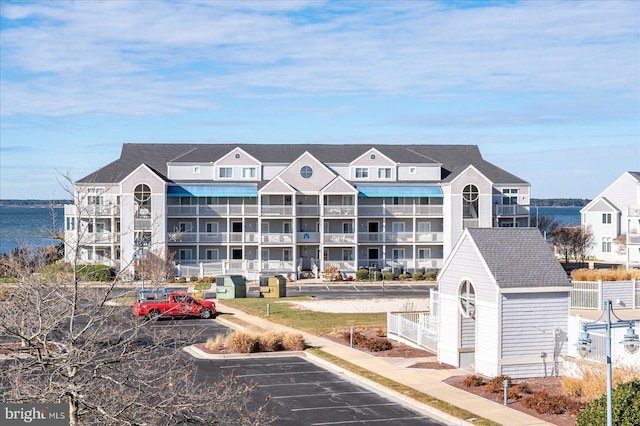 view of building exterior featuring a water view