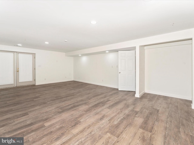 basement with wood-type flooring