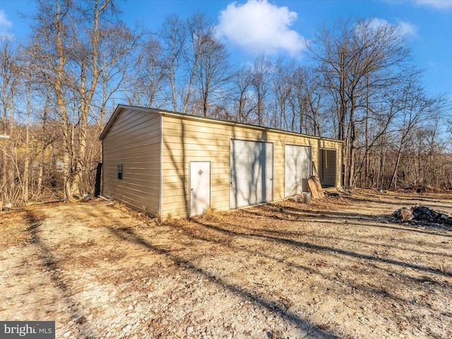 view of outdoor structure with a garage