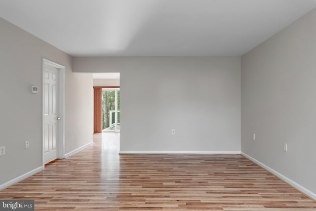 unfurnished room featuring light hardwood / wood-style flooring