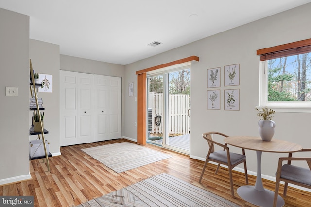 doorway to outside featuring light wood-type flooring