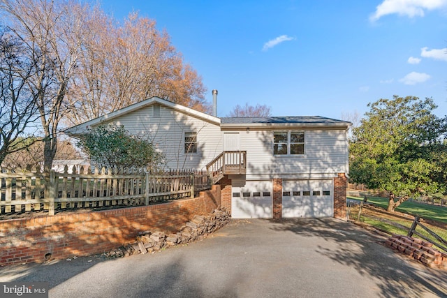 view of front of home featuring a garage