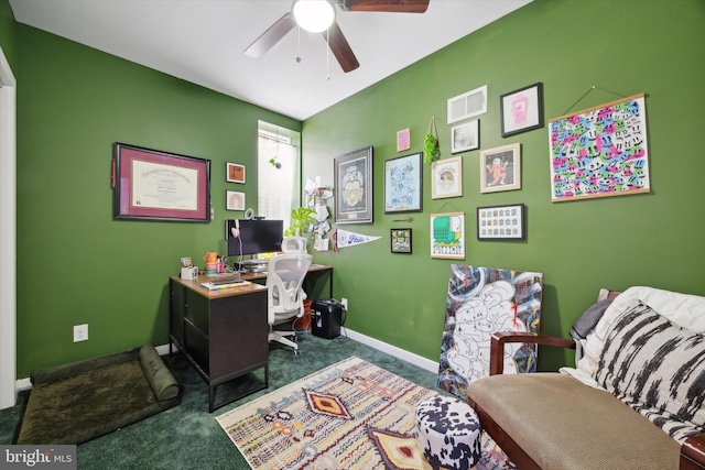 carpeted office featuring ceiling fan