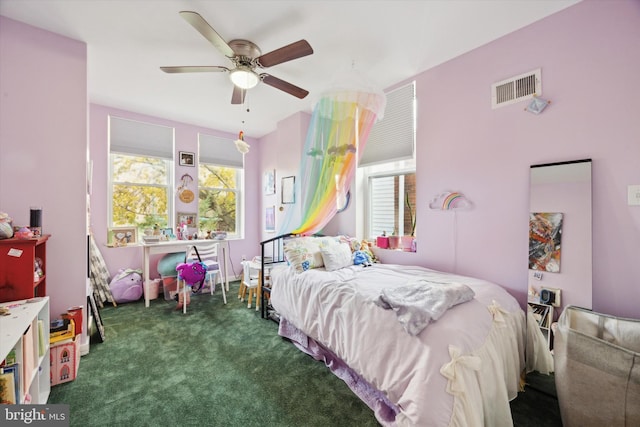 bedroom featuring dark colored carpet and ceiling fan