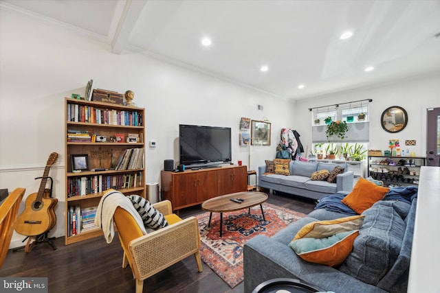 living room with beam ceiling, dark wood-type flooring, and ornamental molding