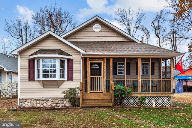 bungalow with a front lawn