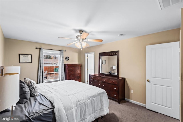 carpeted bedroom with ceiling fan