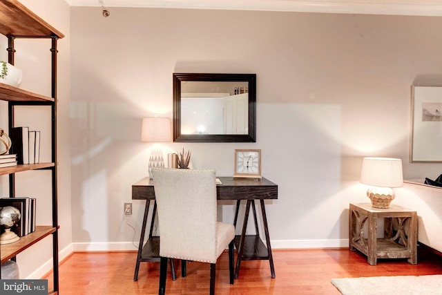 office space with hardwood / wood-style floors