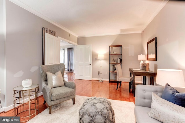 living room featuring hardwood / wood-style floors and ornamental molding