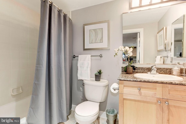 full bathroom with tile patterned flooring, shower / bath combo, vanity, and toilet