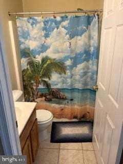 full bathroom with tile patterned flooring, vanity, shower / tub combo with curtain, and toilet