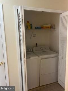 washroom featuring separate washer and dryer