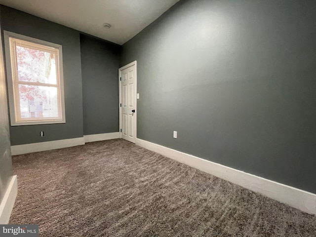 unfurnished room with carpet