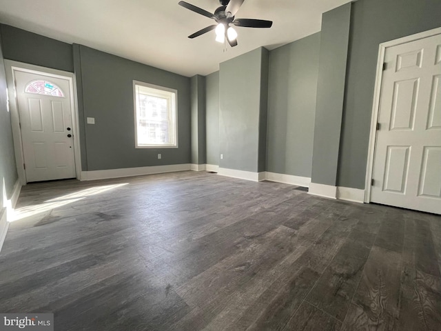 foyer featuring ceiling fan and dark hardwood / wood-style floors