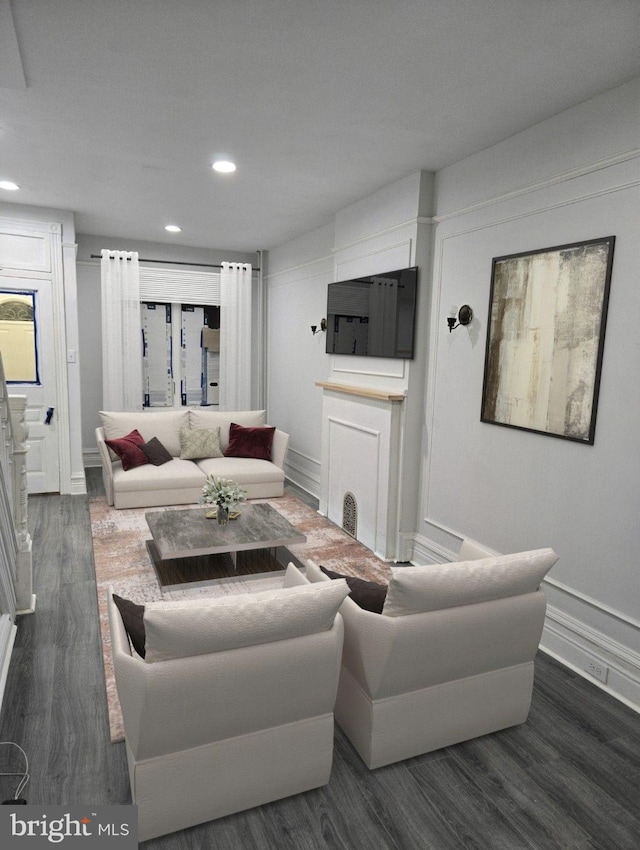 living room featuring dark hardwood / wood-style flooring