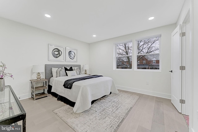 bedroom with light wood-type flooring