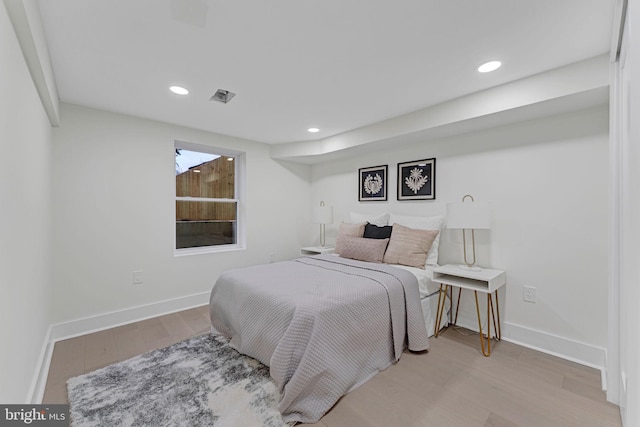 bedroom with light wood-type flooring