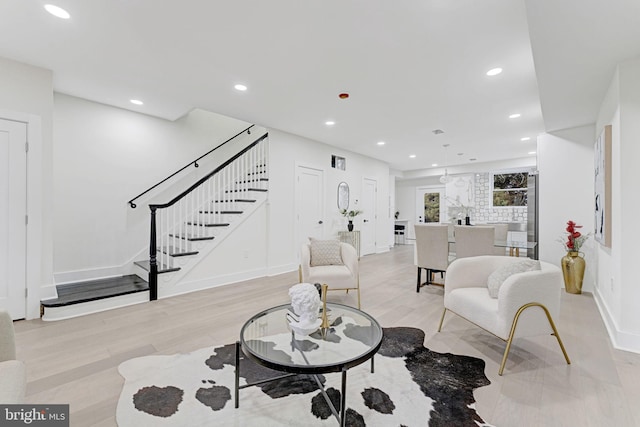 living room with light hardwood / wood-style floors