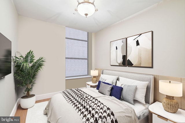 bedroom featuring hardwood / wood-style floors