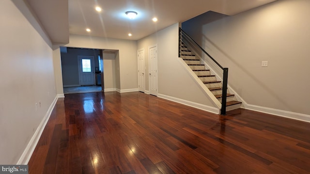 interior space with dark wood-type flooring