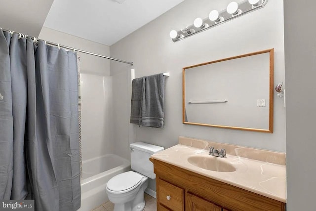 full bathroom featuring tile patterned floors, toilet, vanity, and shower / tub combo