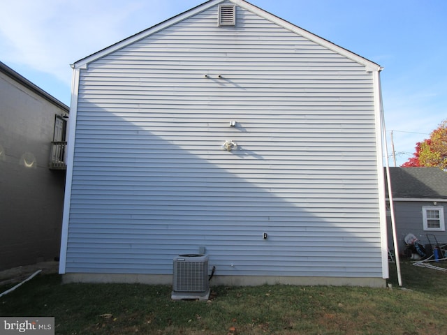 view of property exterior featuring central AC