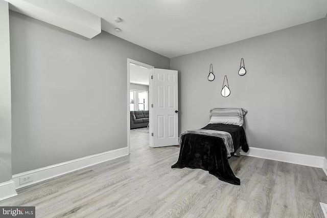 bedroom featuring light wood-type flooring