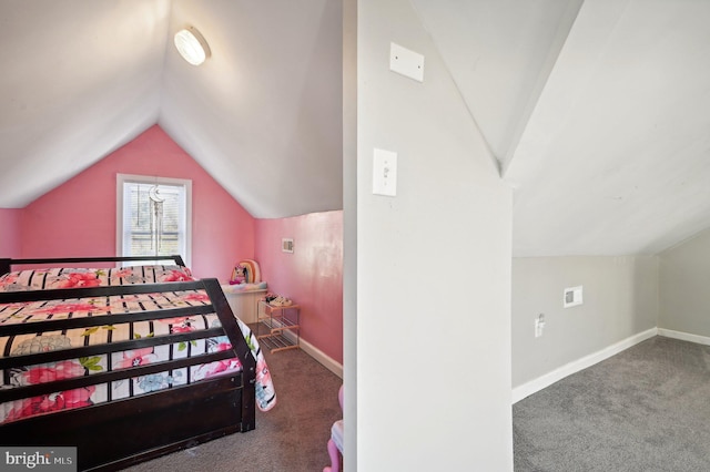 carpeted bedroom featuring lofted ceiling