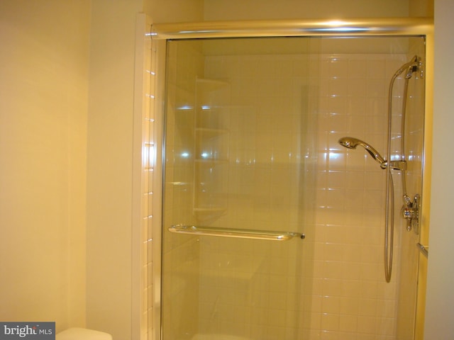 bathroom featuring an enclosed shower